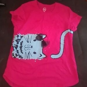 A kid shirt with a cat on it